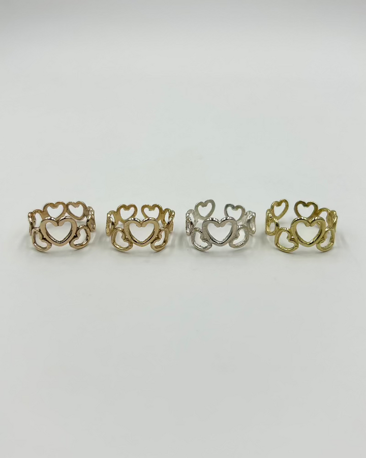 Anello a fascia regolabile con cuoricini  in bronzo o argento effetto tatuaggio sulle dita
