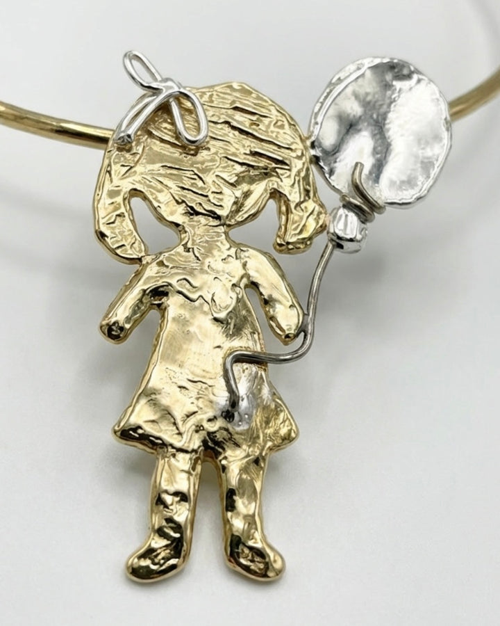 Ciondolo bambolina con palloncino in bronzo e argento