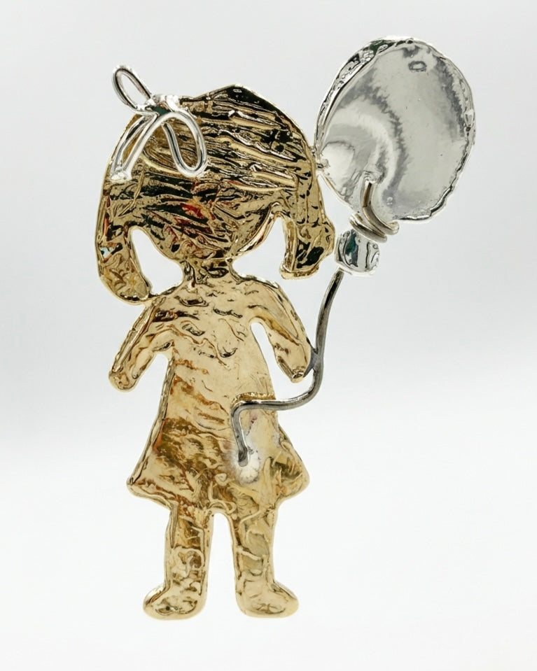 Ciondolo bambolina con palloncino in bronzo e argento