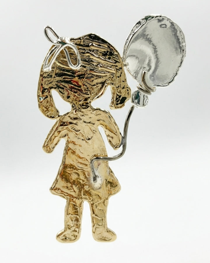 Ciondolo bambolina con palloncino in bronzo e argento